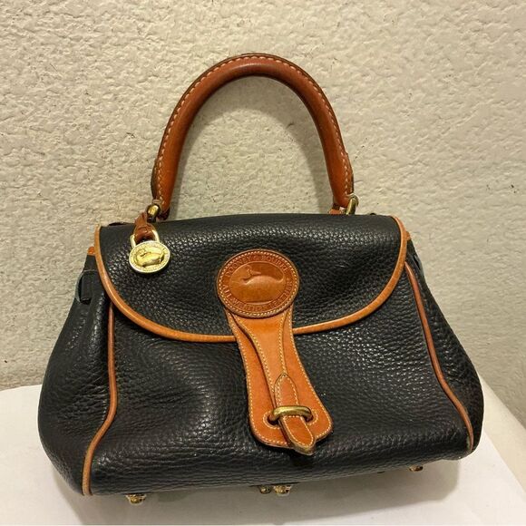 Dooney & Bourke Handbags - Dooney & Bourke Essex all weather Black and Tan Satchel